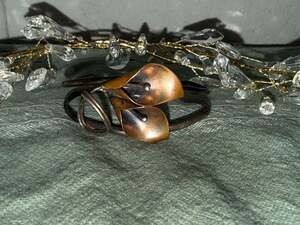 An Art Deco Style American Solid Sterling Silver Lily Bangle by Stuart Nye -